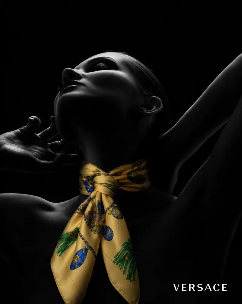 Versace scarf portrait in black with a gold scarf